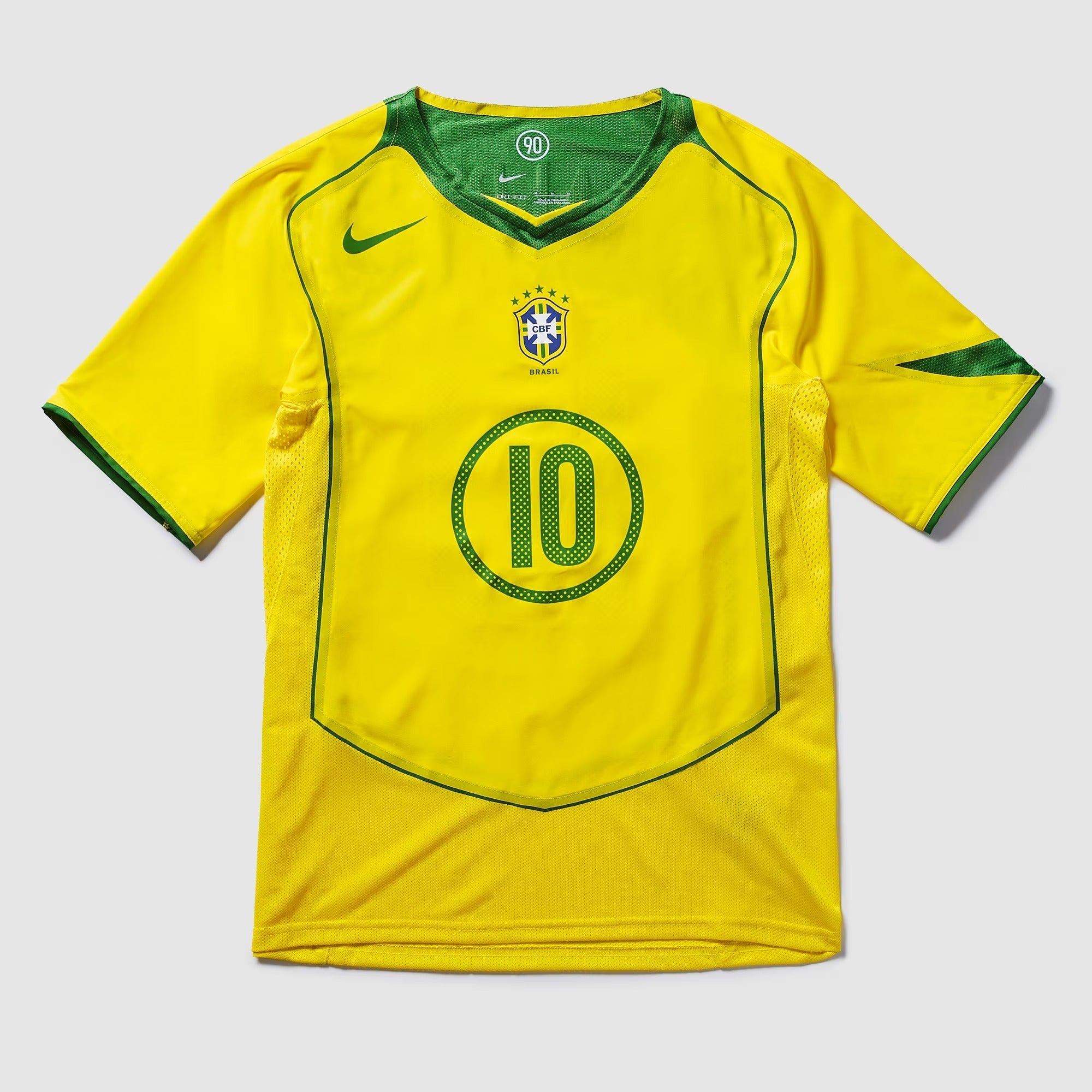 Camisa Nike Brasil Reedição Total 90 Ronaldinho Masculina <span class="lbx-verified" aria-label="Produto verificado">
<img src="https://cdn-icons-png.flaticon.com/512/1828/1828640.png" alt="Produto verificado">
</span>