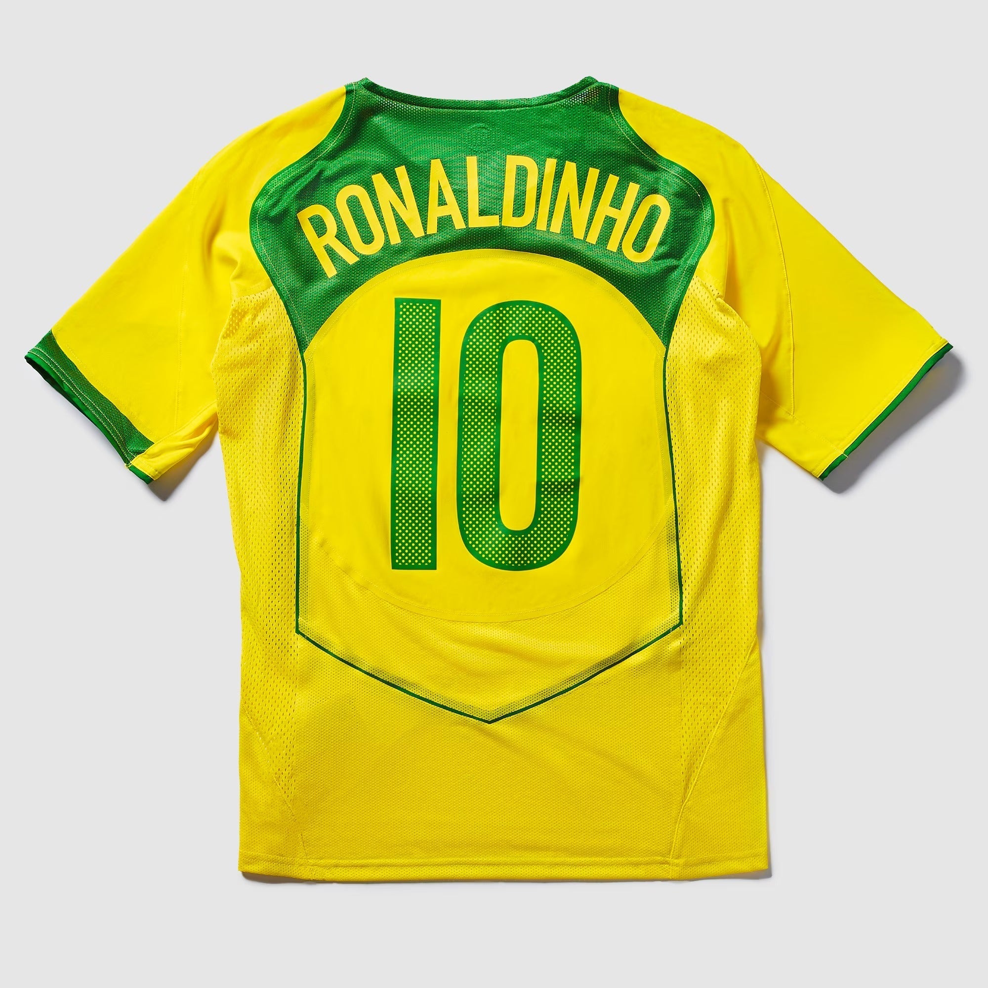 Camisa Nike Brasil Reedição Total 90 Ronaldinho Masculina <span class="lbx-verified" aria-label="Produto verificado">
<img src="https://cdn-icons-png.flaticon.com/512/1828/1828640.png" alt="Produto verificado">
</span>
