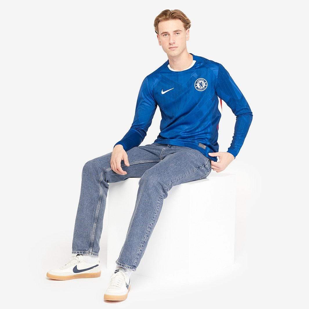Camisa Nike Chelsea 2025/26 I Manga Longa Torcedor        <span class="lbx-verified" aria-label="Produto verificado">
            <img src="https://cdn-icons-png.flaticon.com/512/1828/1828640.png" alt="Produto verificado">
        </span>