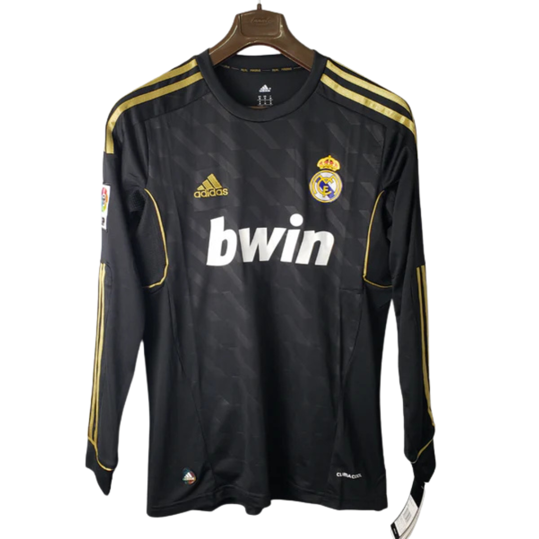 Camisa Manga Longa Real Madrid 2012 Adidas – Preto        <span class="lbx-verified" aria-label="Produto verificado">
            <img src="https://cdn-icons-png.flaticon.com/512/1828/1828640.png" alt="Produto verificado">
        </span>