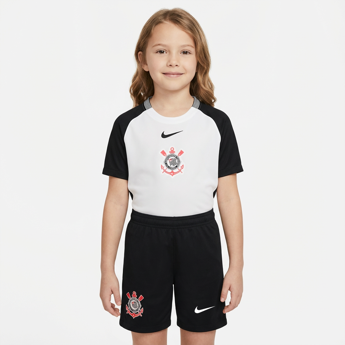 Conjunto Infantil Feminino Nike Corinthians 2025/26 I        <span class="lbx-verified" aria-label="Produto verificado">
            <img src="https://cdn-icons-png.flaticon.com/512/1828/1828640.png" alt="Produto verificado">
        </span>